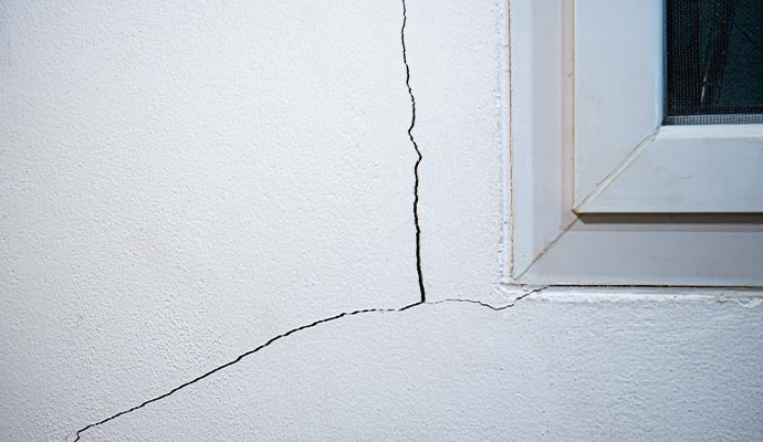 Crack behind window wall